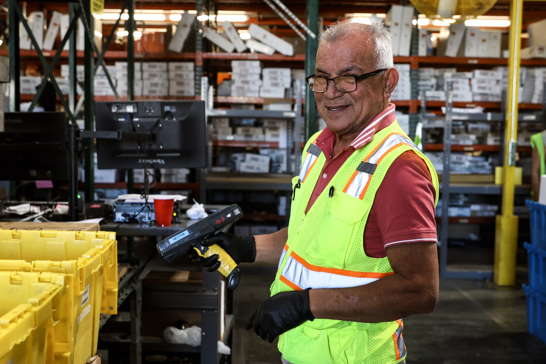 EMPRO warehouse associate scanning inventory