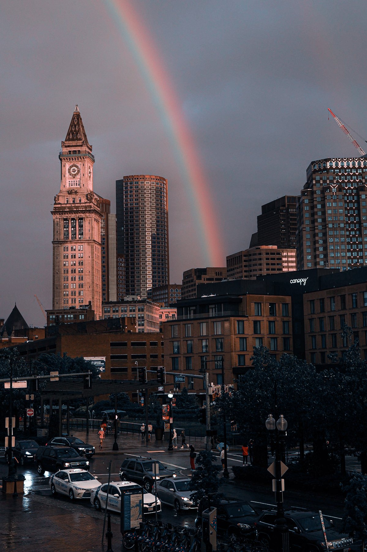 Rainbow over Boston skyline and Customs House tower